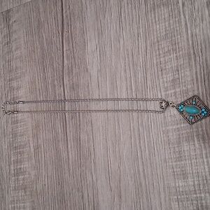 Elegant Silver and Turquoise Pendant Necklace